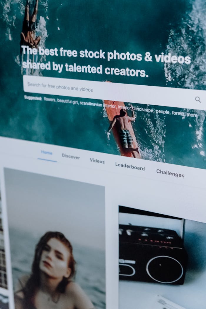 The Art of Drawing Readers In: Your attractive post title goes here Close-up of a computer screen showing a stock photo website interface with multiple images.